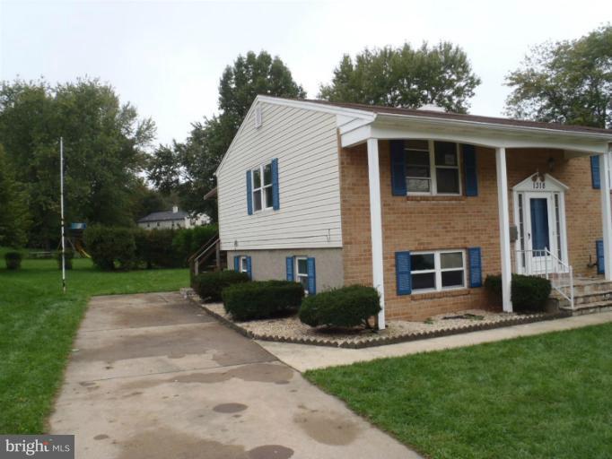 1318 Gatefield Road Catonsville, MD 21228 - Photo 3 of 14 a view of a house with backyard and garden