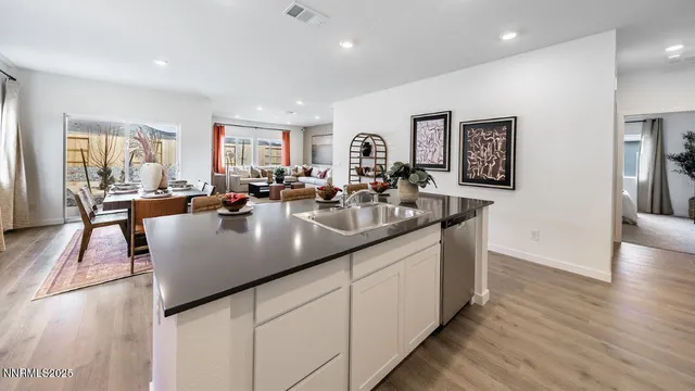 a view of a living room and dining room