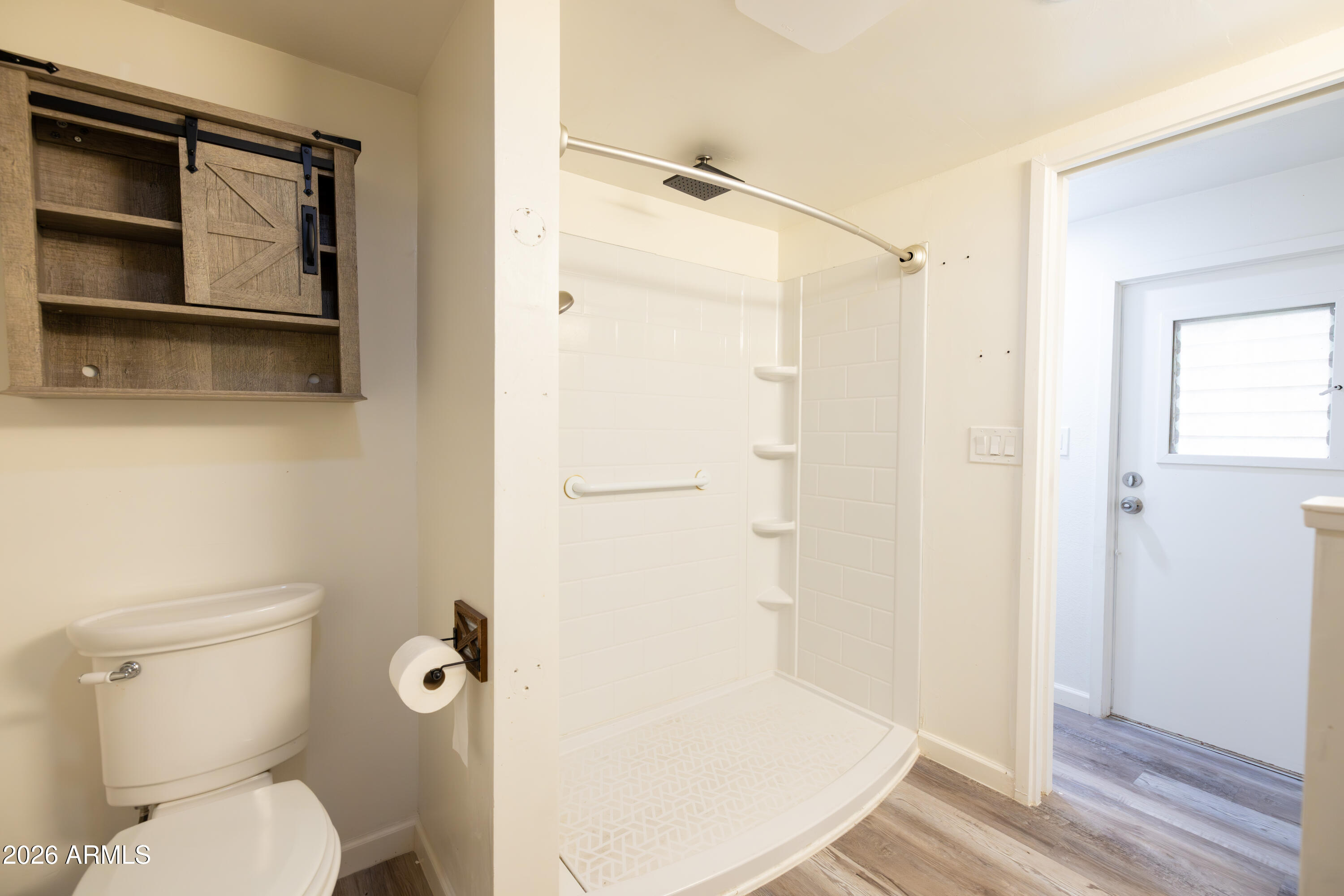 535 South Alma School Road, Unit 17 Mesa, AZ 85210 - Photo 17 of 17 a bathroom with a toilet and a shower
