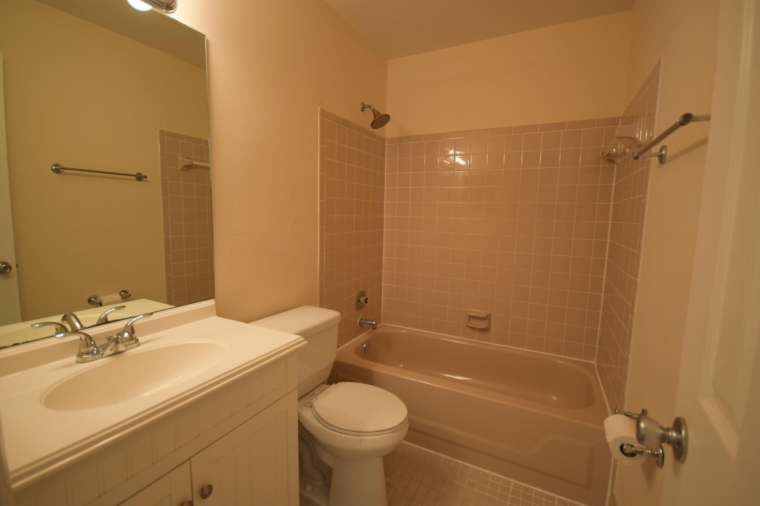 9129 Affirmed Lane Boca Raton, FL 33496 - Photo 11 of 12 a bathroom with a sink toilet and shower