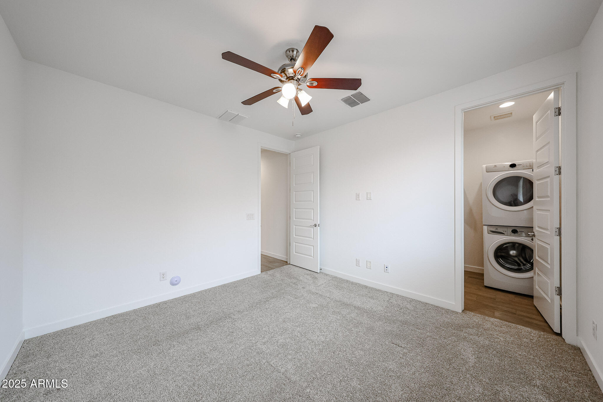 12526 West Morten Avenue Glendale, AZ 85307 - Photo 11 of 27 wooden floor in an empty room