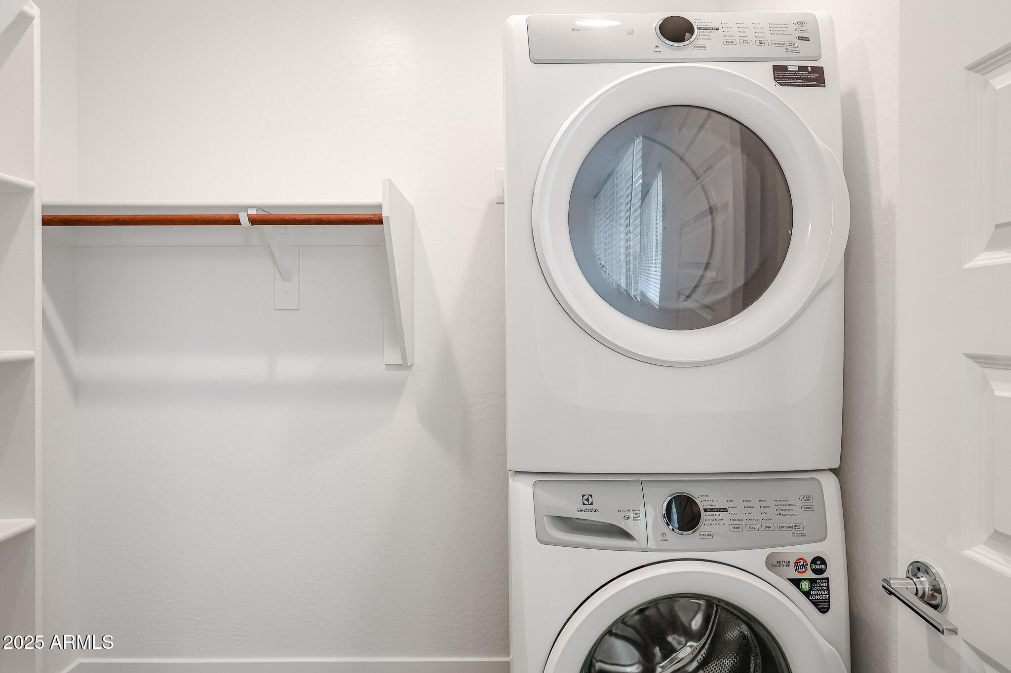 12526 West Morten Avenue Glendale, AZ 85307 - Photo 12 of 27 a utility room with dryer and washer