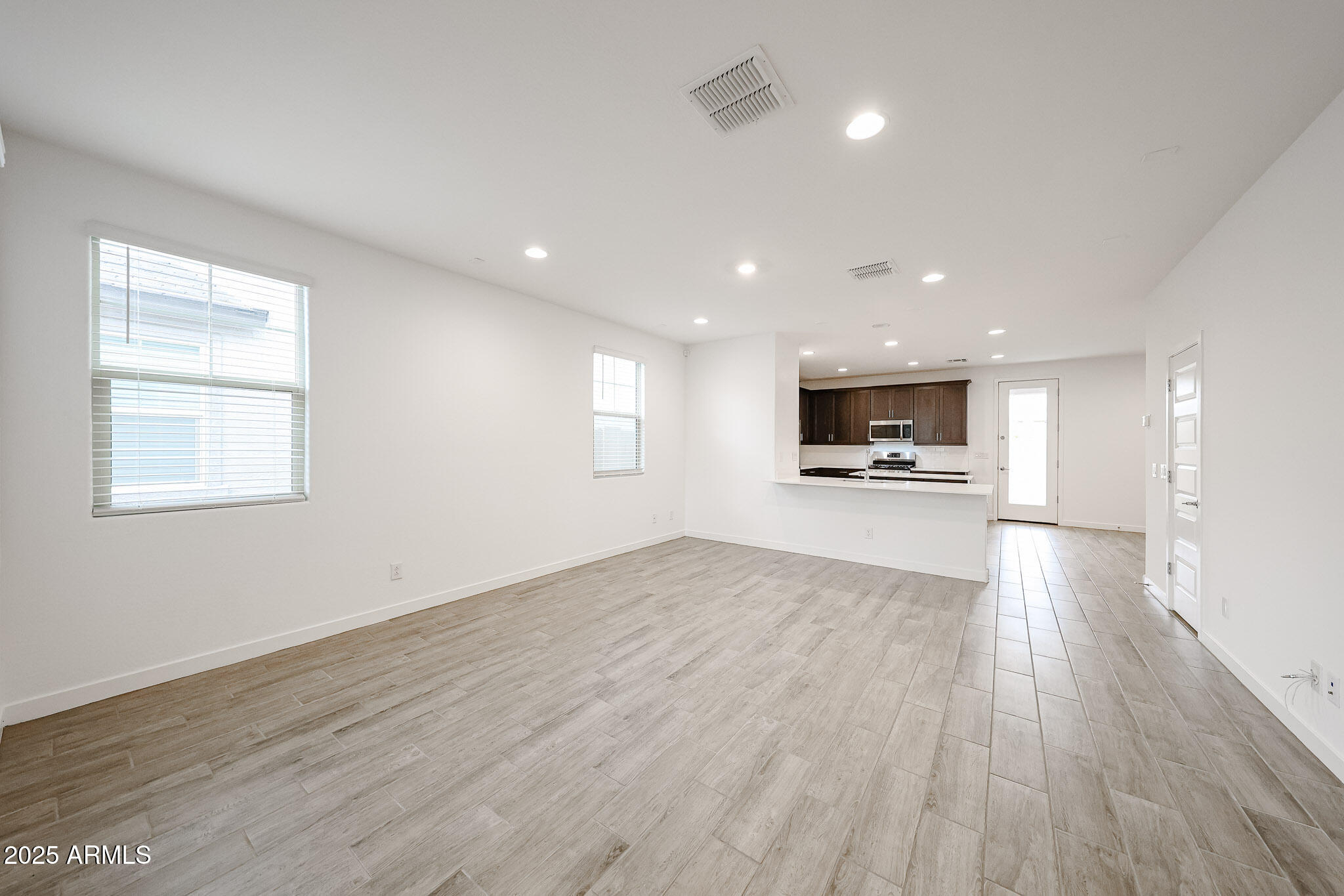 12526 West Morten Avenue Glendale, AZ 85307 - Photo 5 of 27 a view of kitchen with sink and microwave