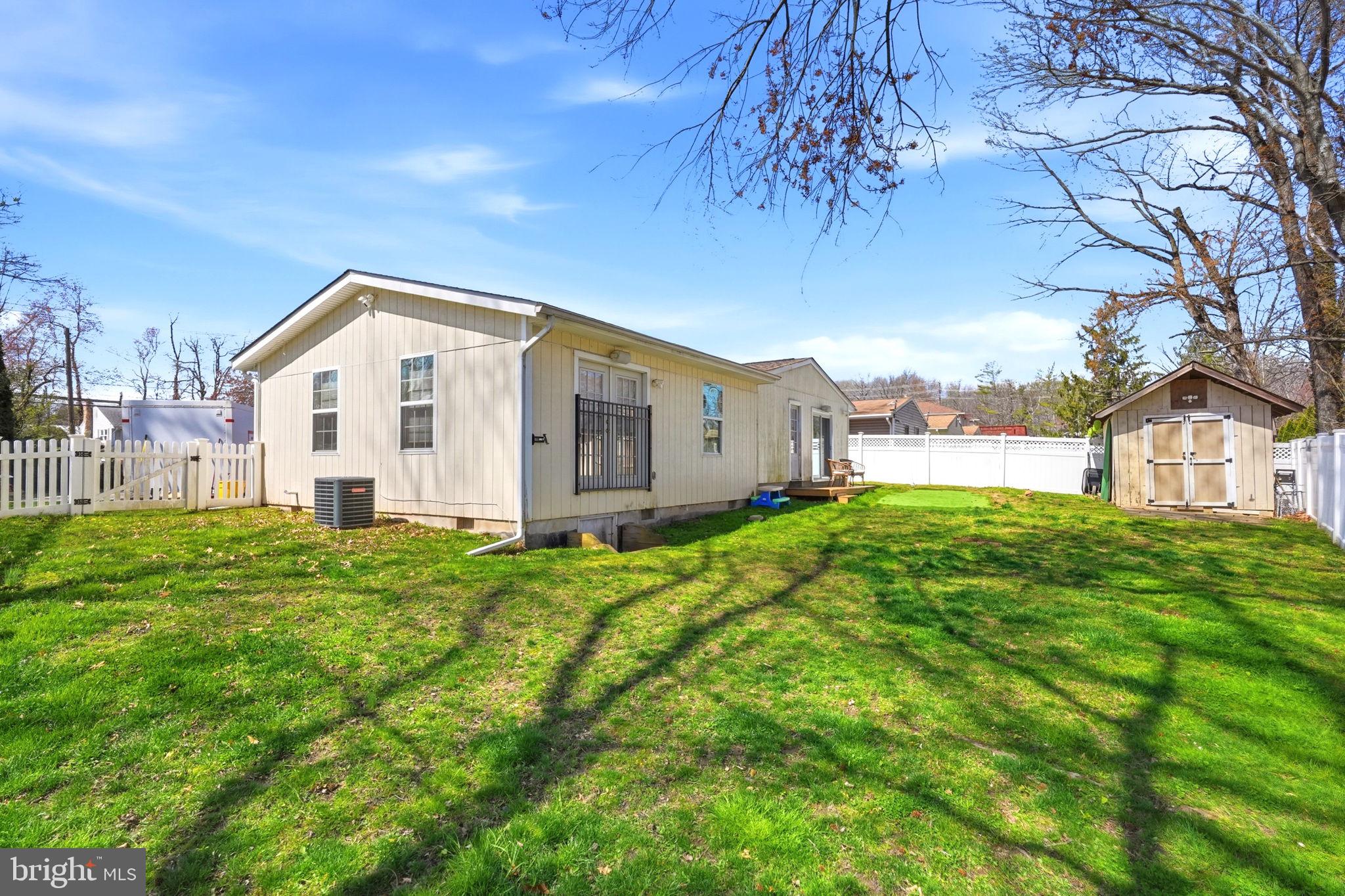 15 Deans Rhode Hall Road Monmouth Junction, NJ 08852 - Photo 22 of 24 a view of a back yard of the house