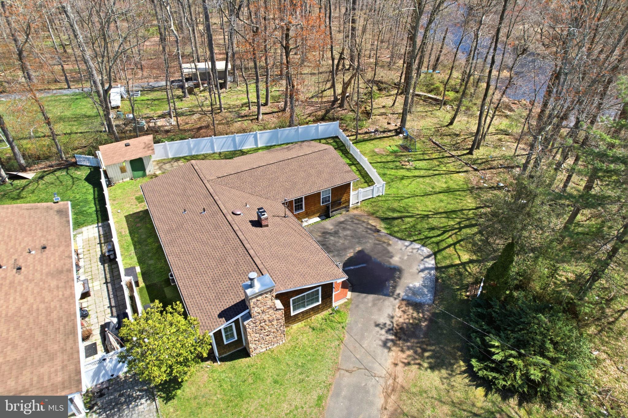 15 Deans Rhode Hall Road Monmouth Junction, NJ 08852 - Photo 24 of 24 an aerial view of a house with a yard