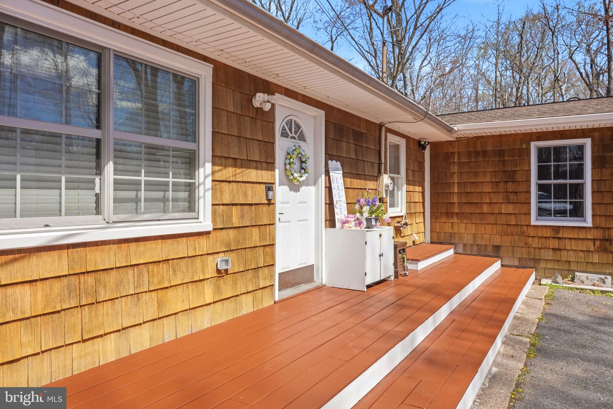 15 Deans Rhode Hall Road Monmouth Junction, NJ 08852 - Photo 3 of 24 a view of a backyard with seating area