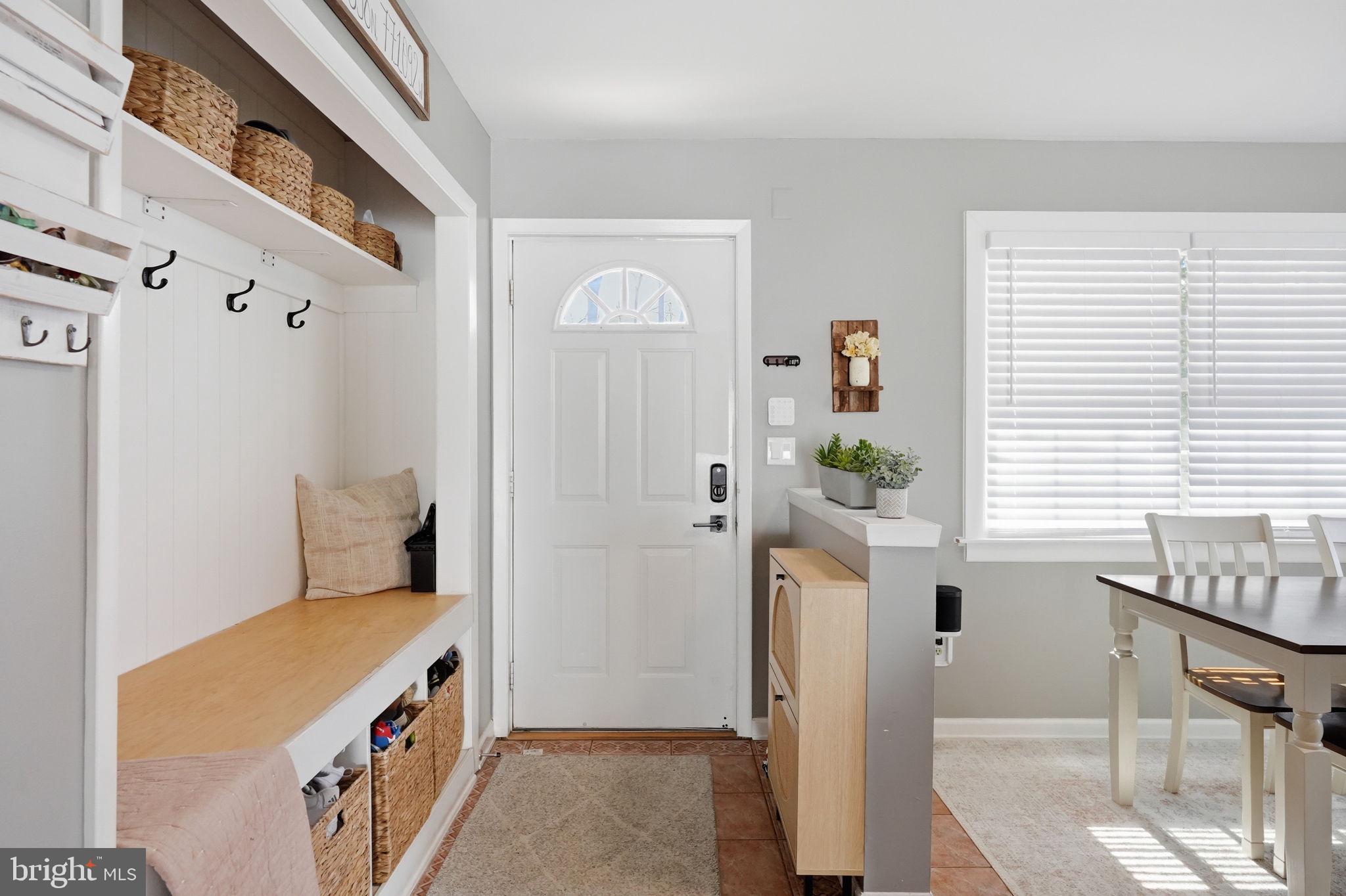 15 Deans Rhode Hall Road Monmouth Junction, NJ 08852 - Photo 4 of 24 a bathroom with a sink a mirror and shower