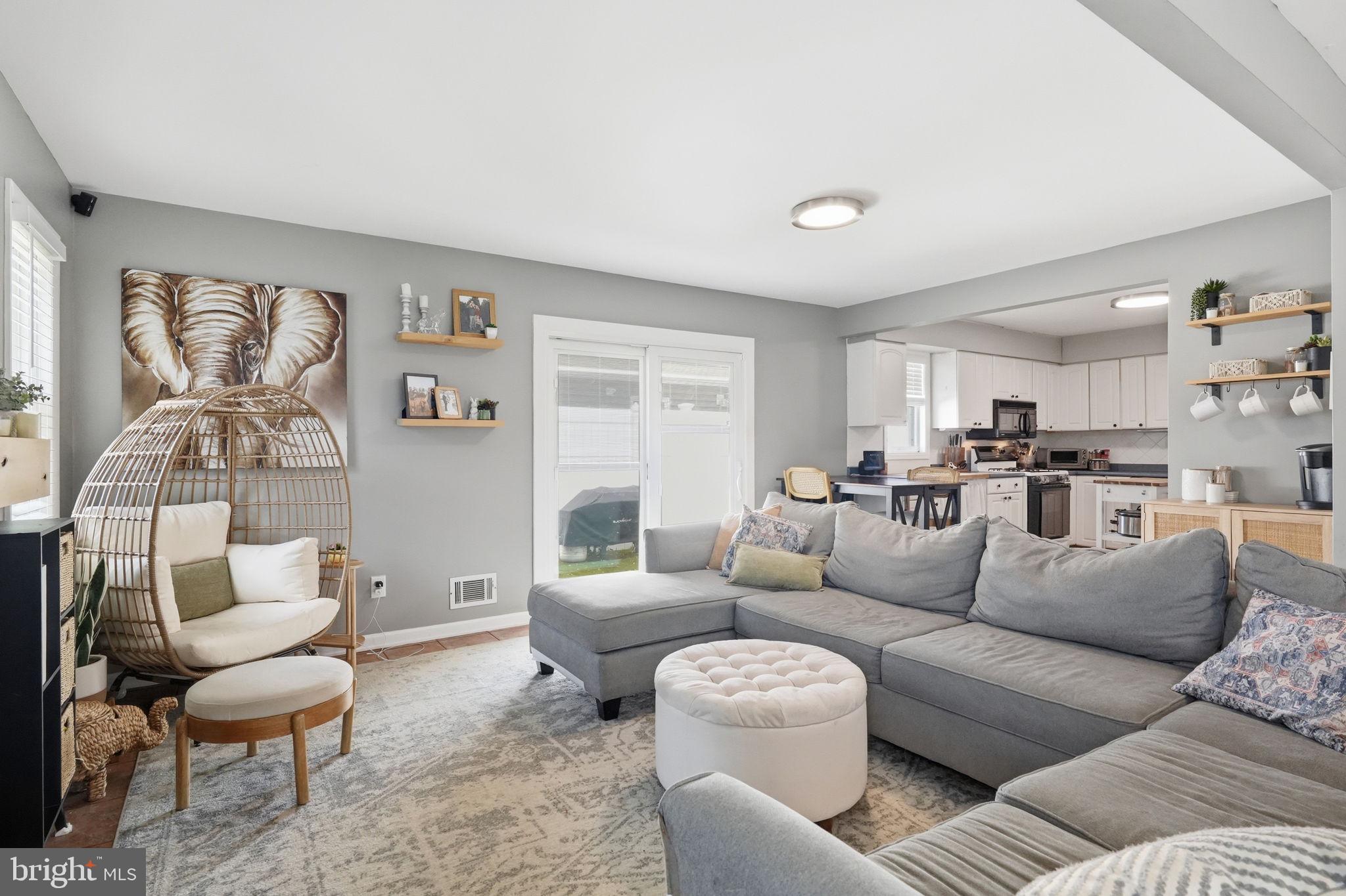 15 Deans Rhode Hall Road Monmouth Junction, NJ 08852 - Photo 5 of 24 a living room with furniture and a large window