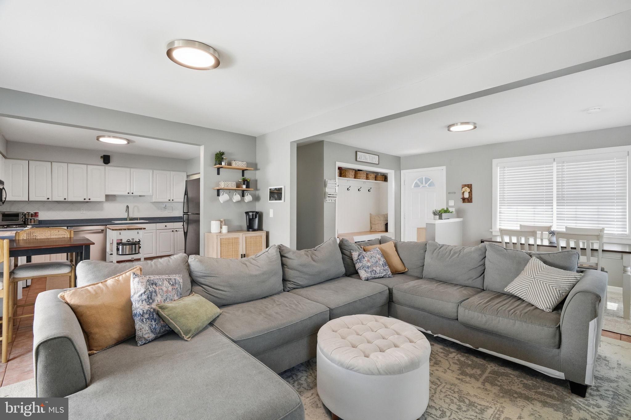 15 Deans Rhode Hall Road Monmouth Junction, NJ 08852 - Photo 6 of 24 a living room with furniture and a large window