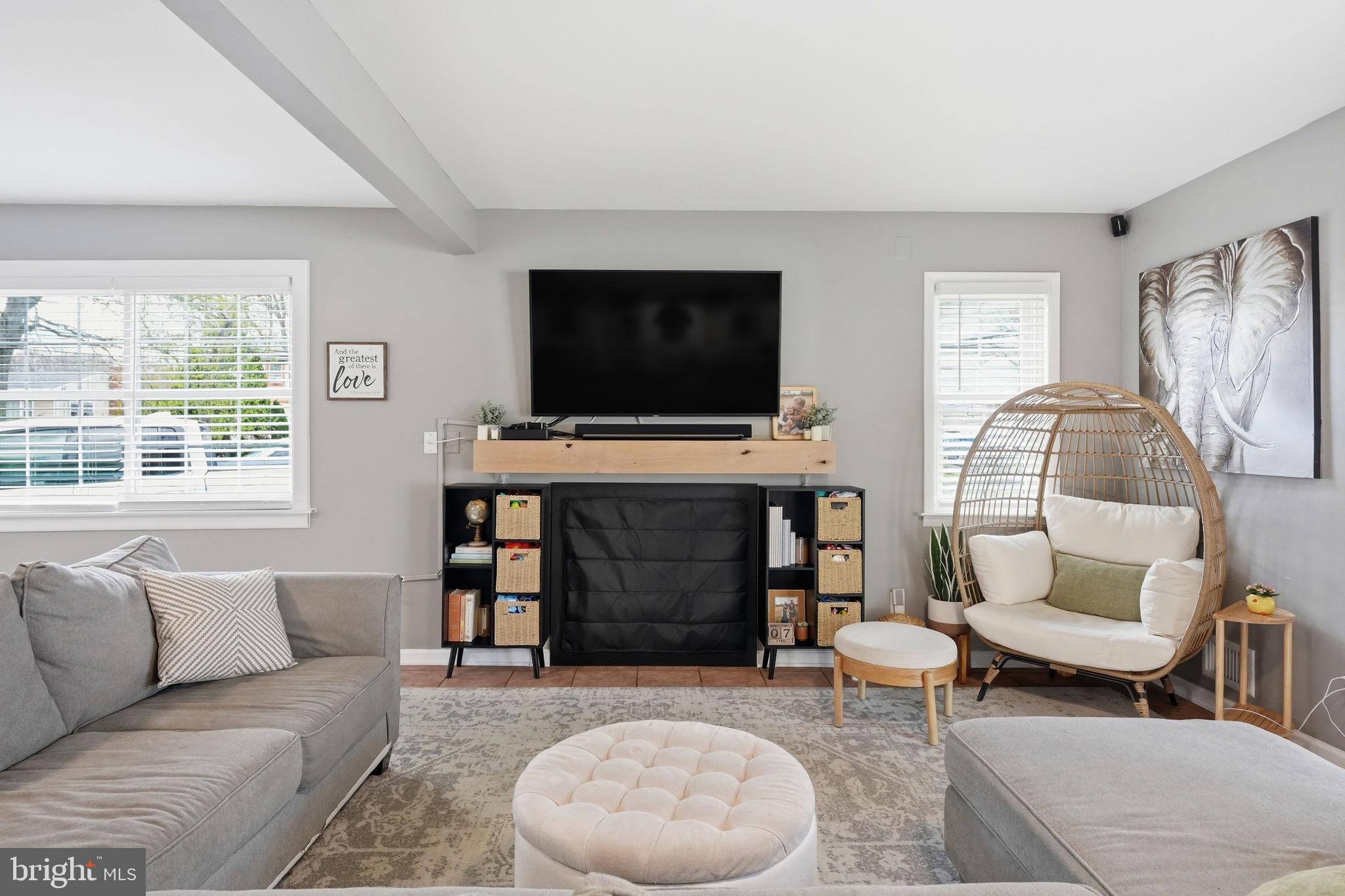 15 Deans Rhode Hall Road Monmouth Junction, NJ 08852 - Photo 8 of 24 a living room with furniture and a flat screen tv