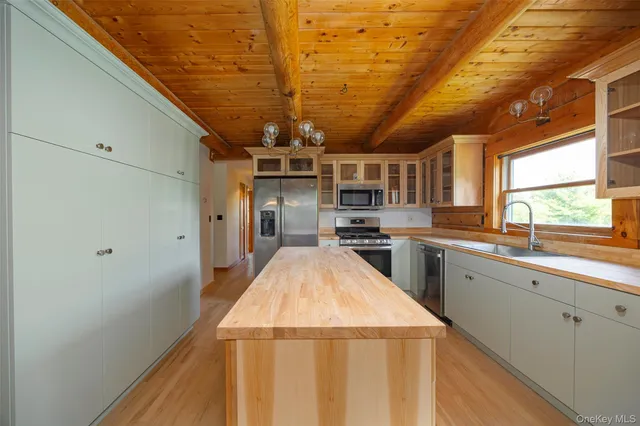 a kitchen with a sink and a window