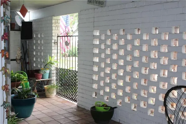 a view of a porch with chairs