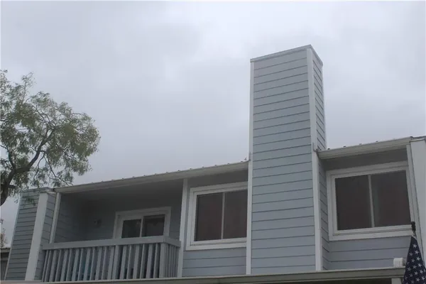 a view of house with deck