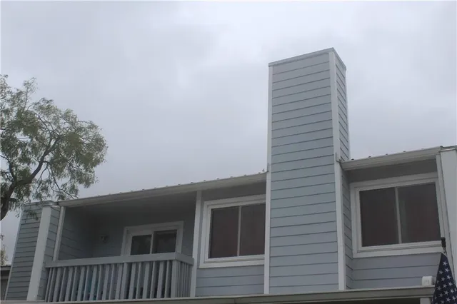 a view of house with deck