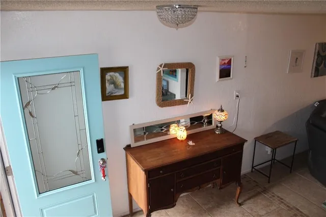 a view of a workspace with furniture