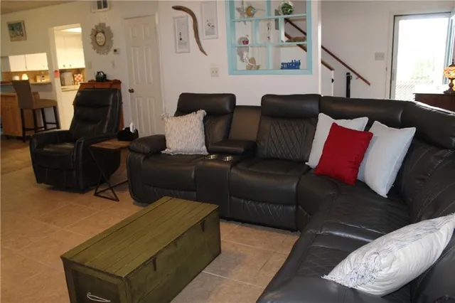 a living room with furniture and a couch