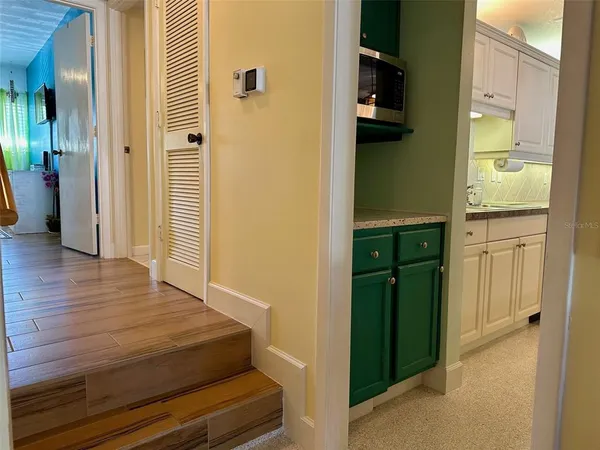 a room with closet and wooden floor