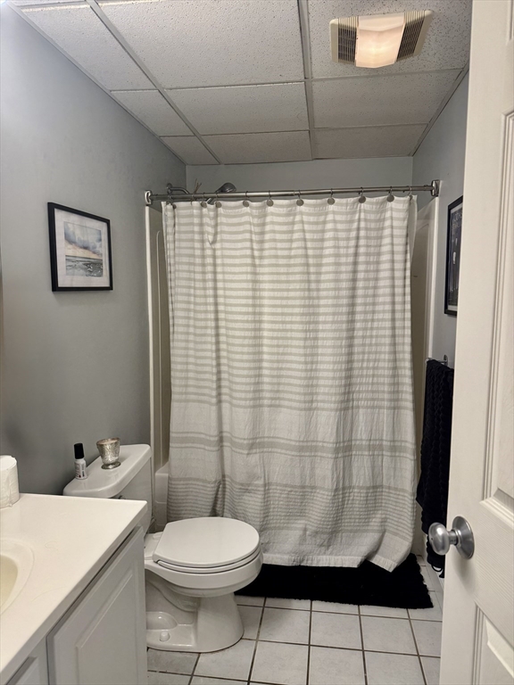 253 Norfolk Street, Unit 22 Cambridge, MA 02139 - Photo 14 of 20 a bathroom with a sink toilet and shower