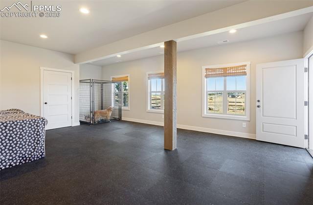 16835 Goshawk Road Colorado Springs, CO 80908 - Photo 41 of 50 extra large bedroom with walkout access and closet