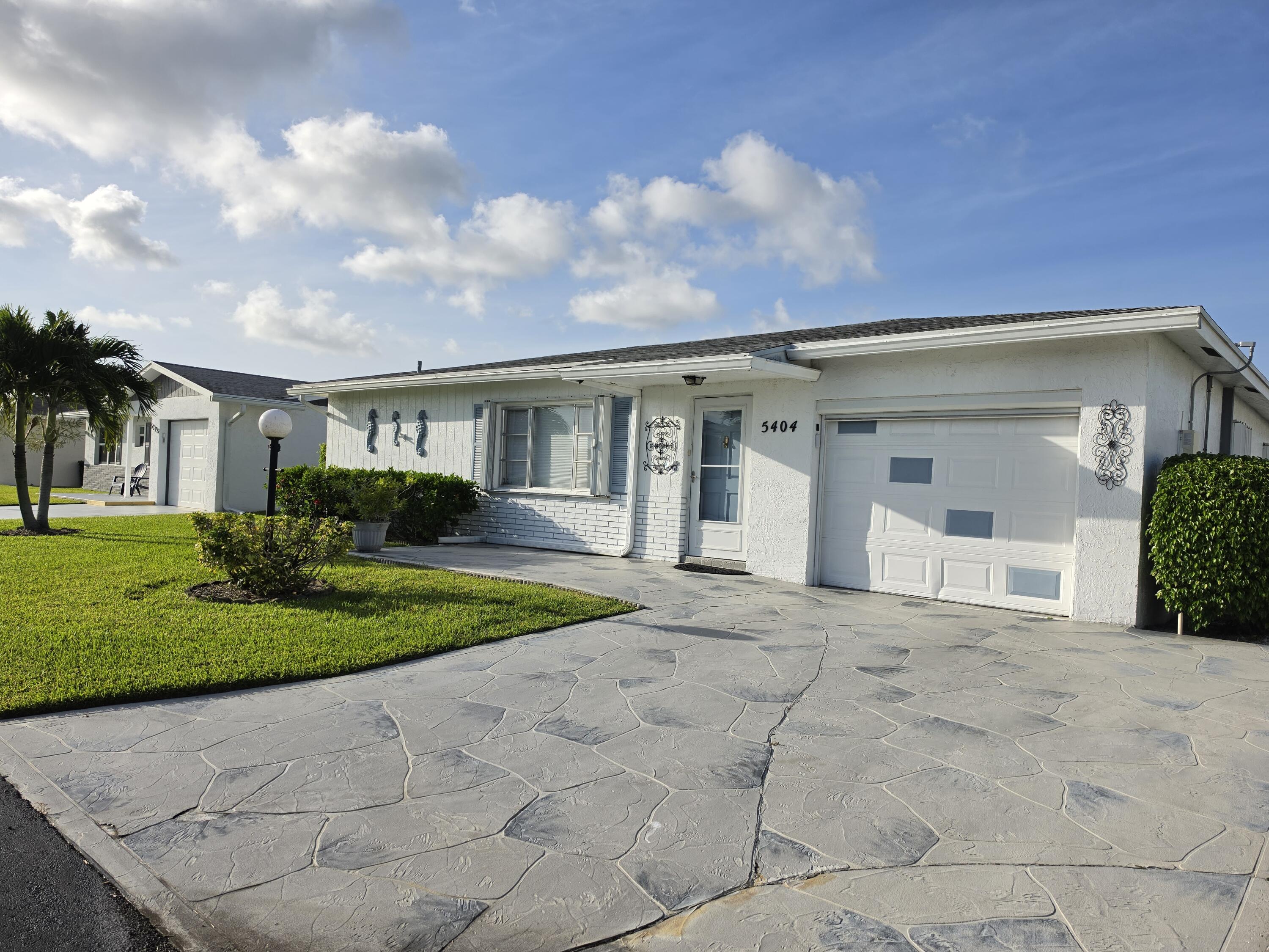 5404 Belleville Road West Palm Beach, FL 33417 - Photo 2 of 42 20260611_080642
