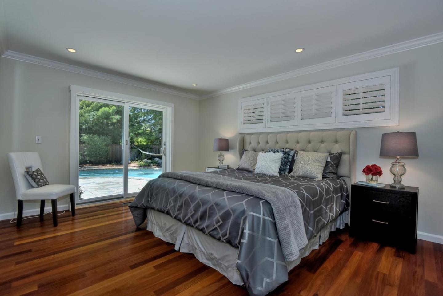 1031 Suffolk Way Los Altos, CA 94024 - Photo 13 of 26 a bedroom with a bed and a window
