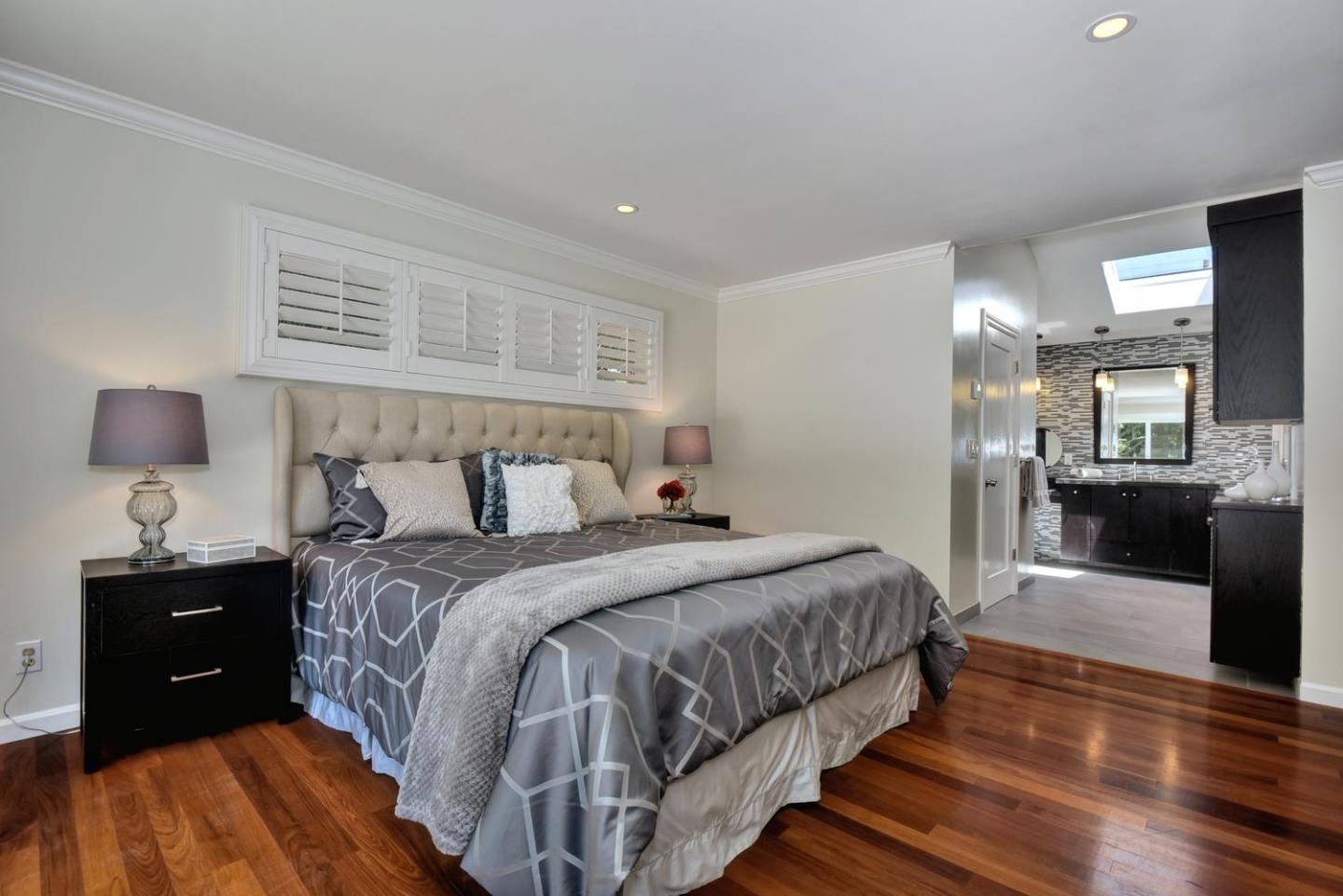 1031 Suffolk Way Los Altos, CA 94024 - Photo 14 of 26 a bedroom with a bed and a couch