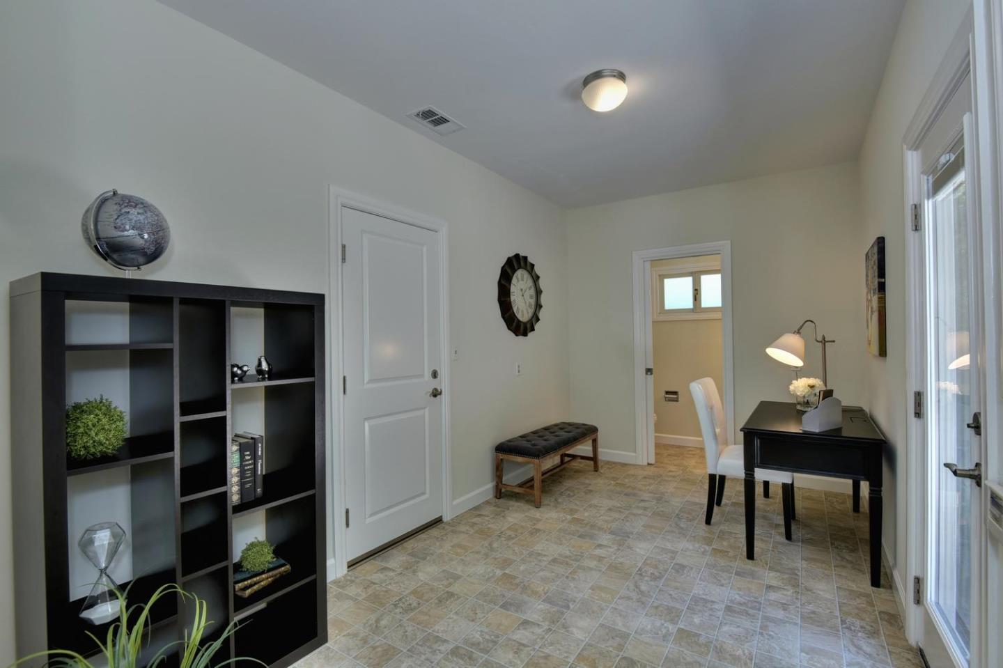 1031 Suffolk Way Los Altos, CA 94024 - Photo 22 of 26 a view of a workspace with furniture and a window