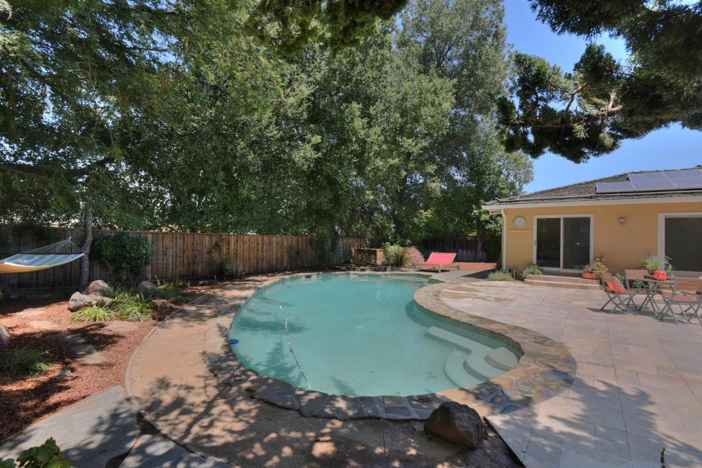 1031 Suffolk Way Los Altos, CA 94024 - Photo 24 of 26 a view of a backyard with sitting area