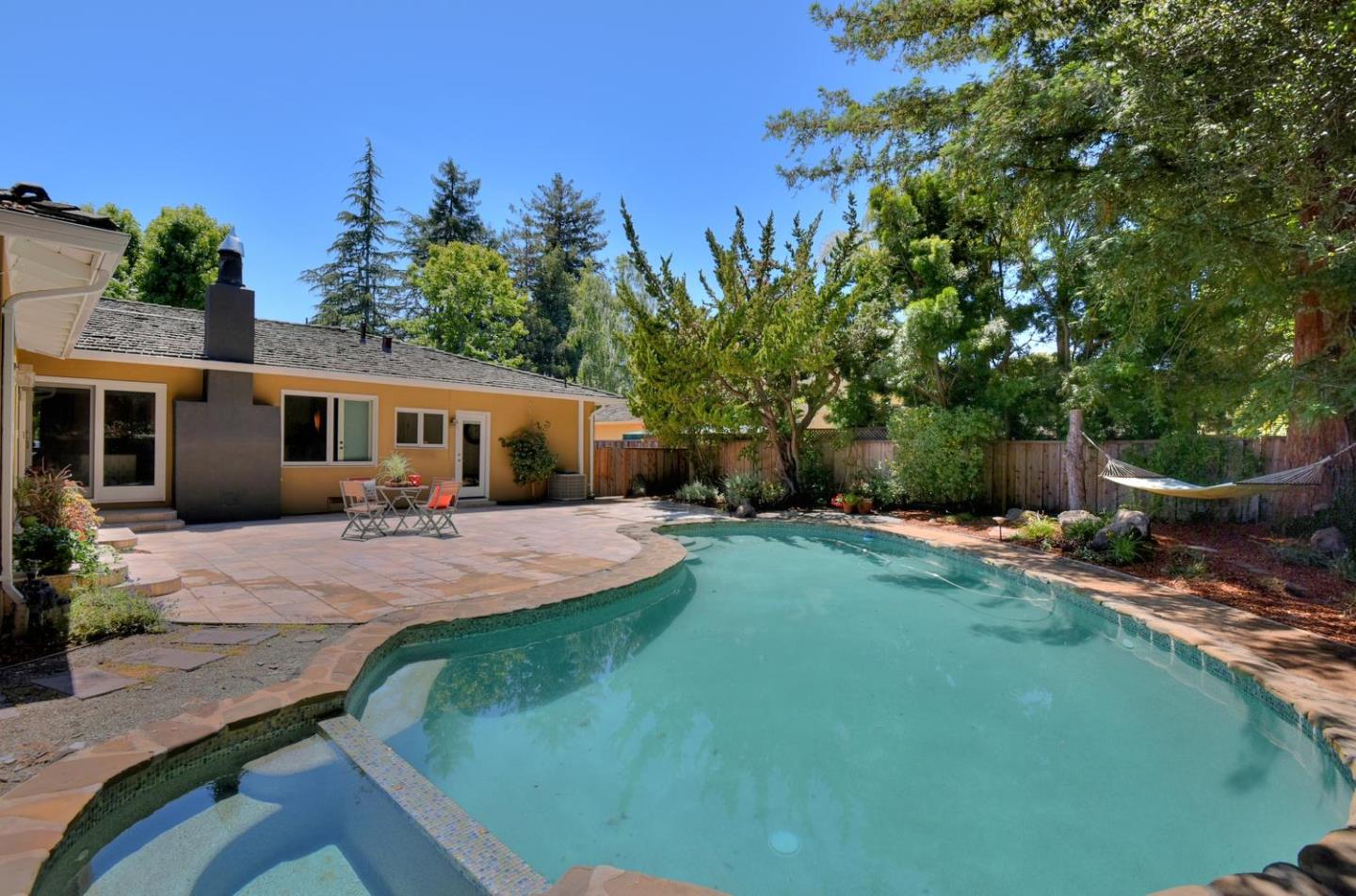 1031 Suffolk Way Los Altos, CA 94024 - Photo 25 of 26 a front view of house with yard and green space