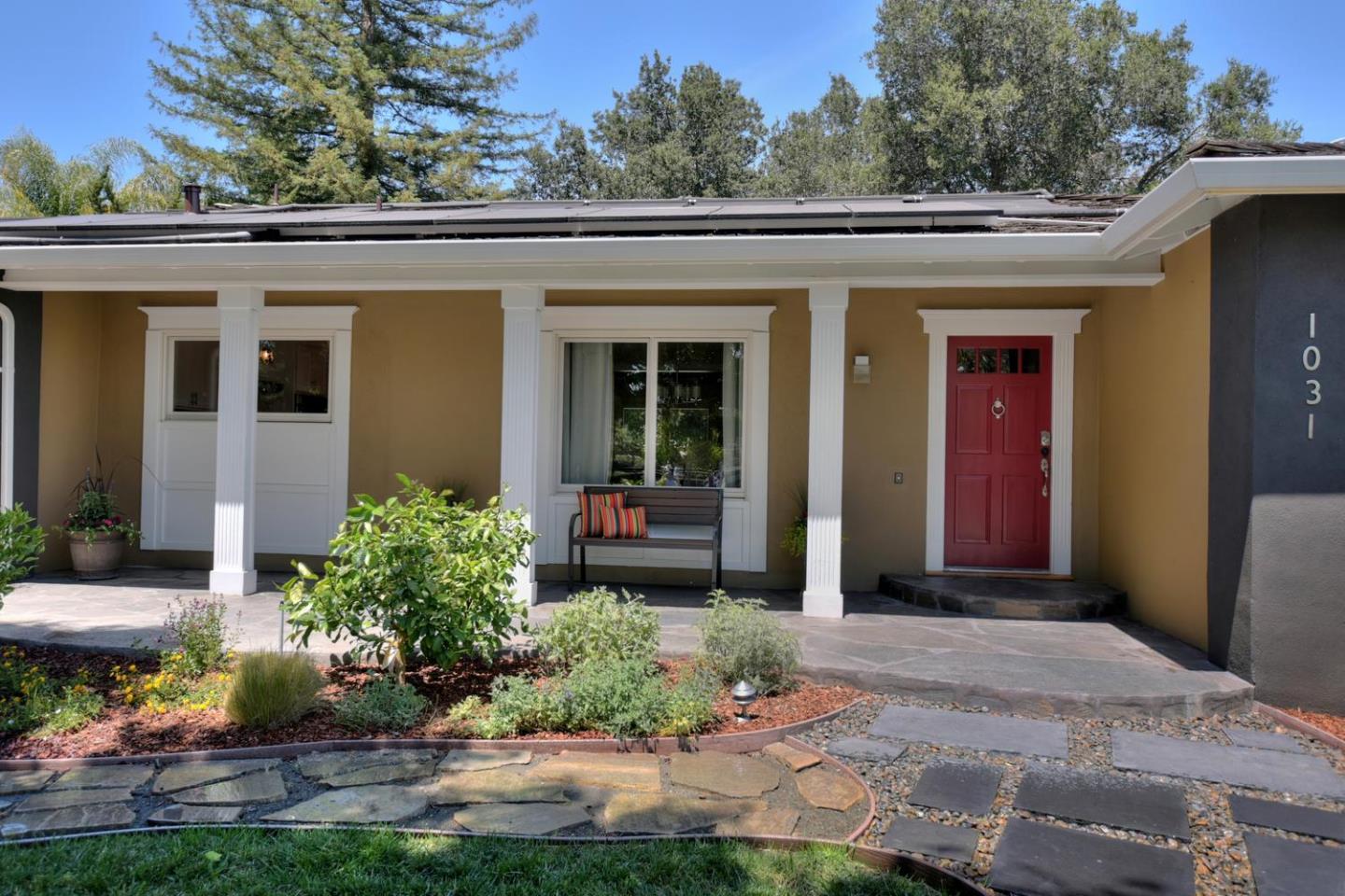 1031 Suffolk Way Los Altos, CA 94024 - Photo 3 of 26 a front view of a house with garden