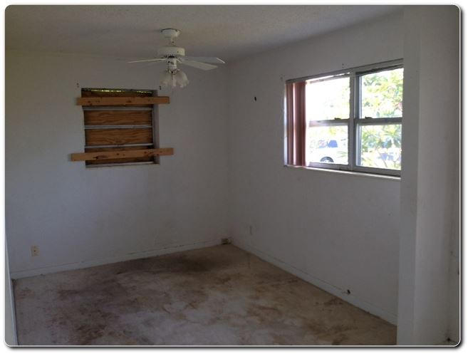328 Shady Lane Road Palm Springs, FL 33461 - Photo 27 of 50 an empty room with a window