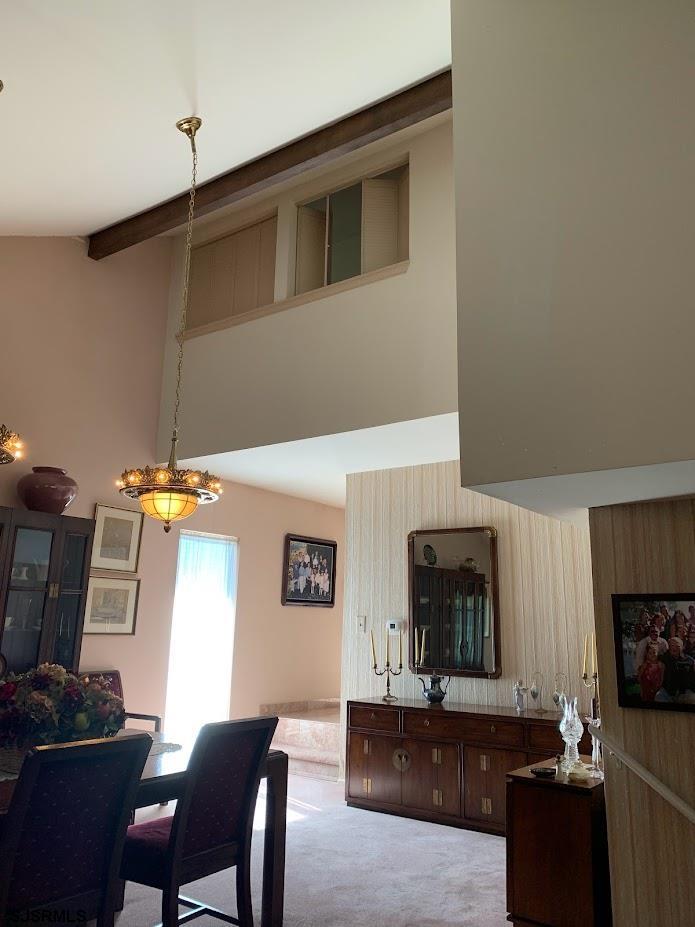 16 Greenbriar Road Marmora, NJ 08223 - Photo 12 of 37 a living room with furniture and a fireplace