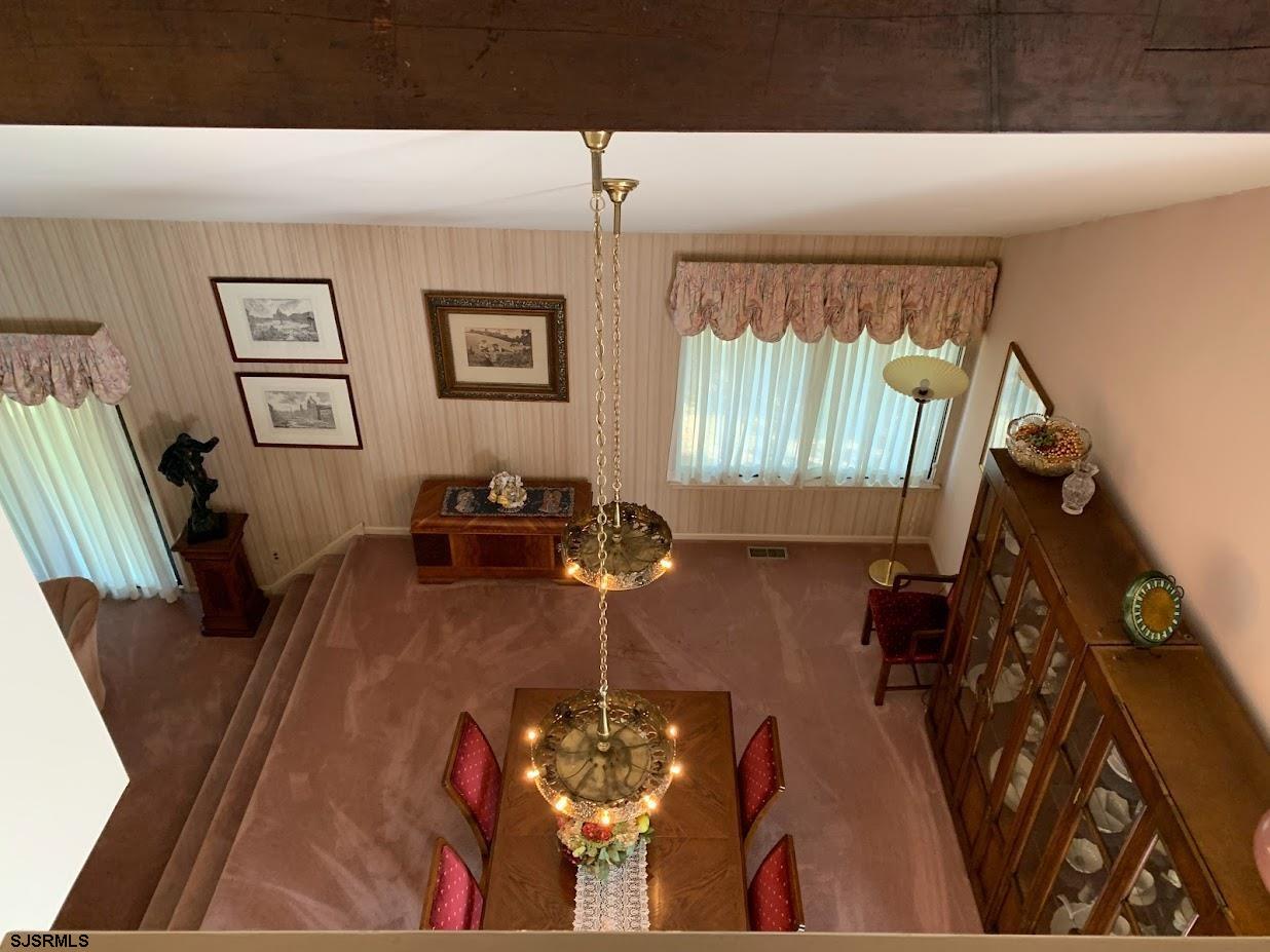 16 Greenbriar Road Marmora, NJ 08223 - Photo 14 of 37 a living room with furniture and a flat screen tv