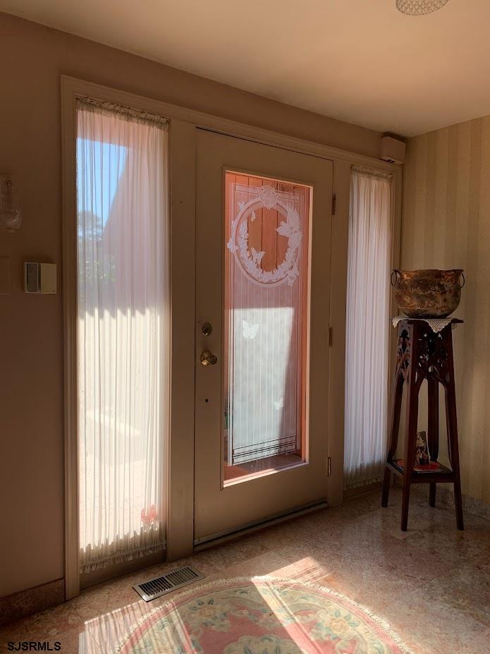 16 Greenbriar Road Marmora, NJ 08223 - Photo 5 of 37 a view of an front door