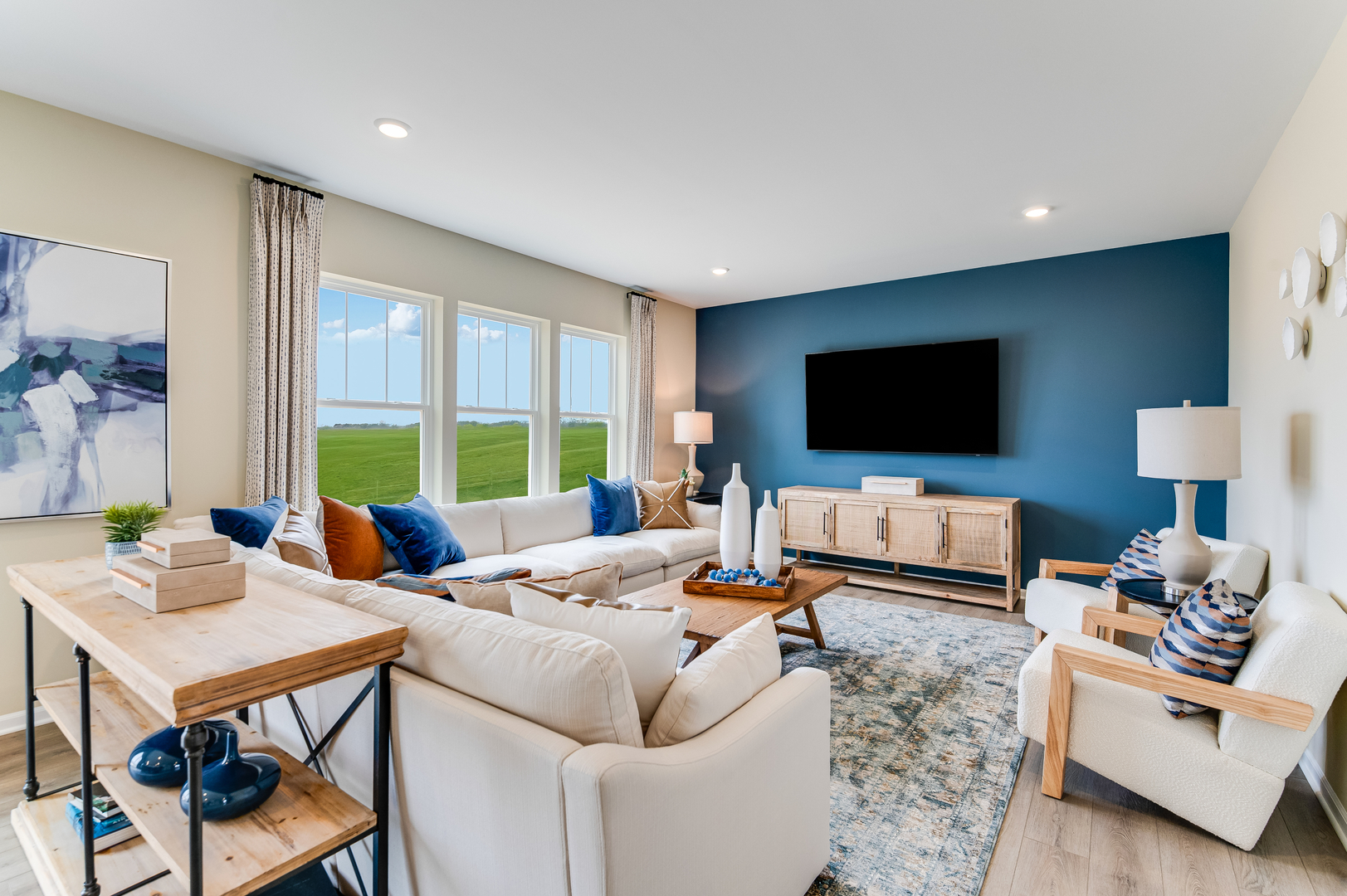 598 Lismore Circle Elgin, IL 60124 - Photo 2 of 24 a living room with furniture and a flat screen tv