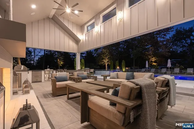 a view of a swimming pool with a patio