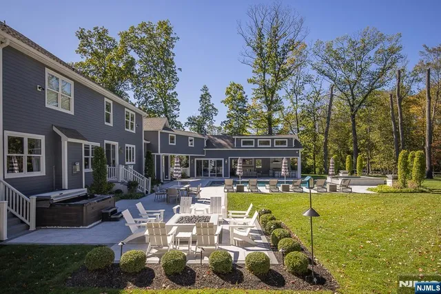 a living room with furniture and large window