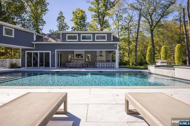 a building with trees in the background