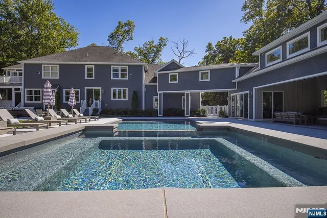 a view of a building with a yard