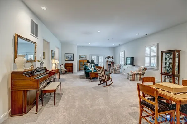 a view of a livingroom with furniture and a livingroom