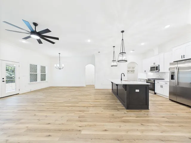 a view of kitchen and sink