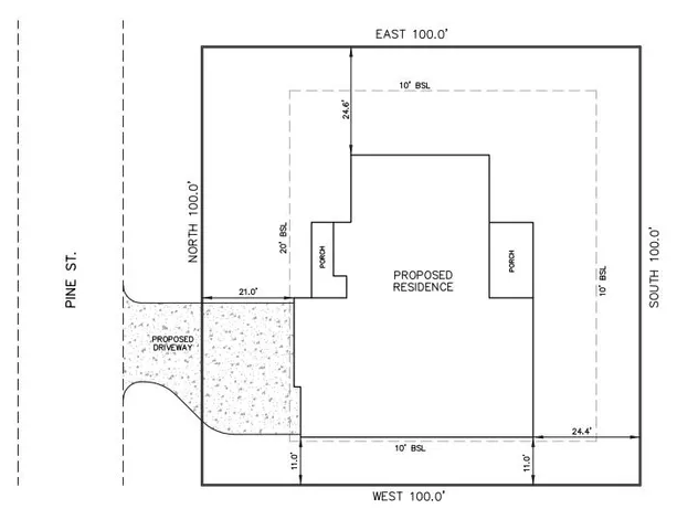 a view of a white building and a window