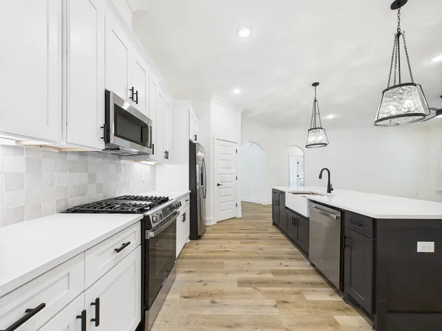 a kitchen with a sink and dishwasher