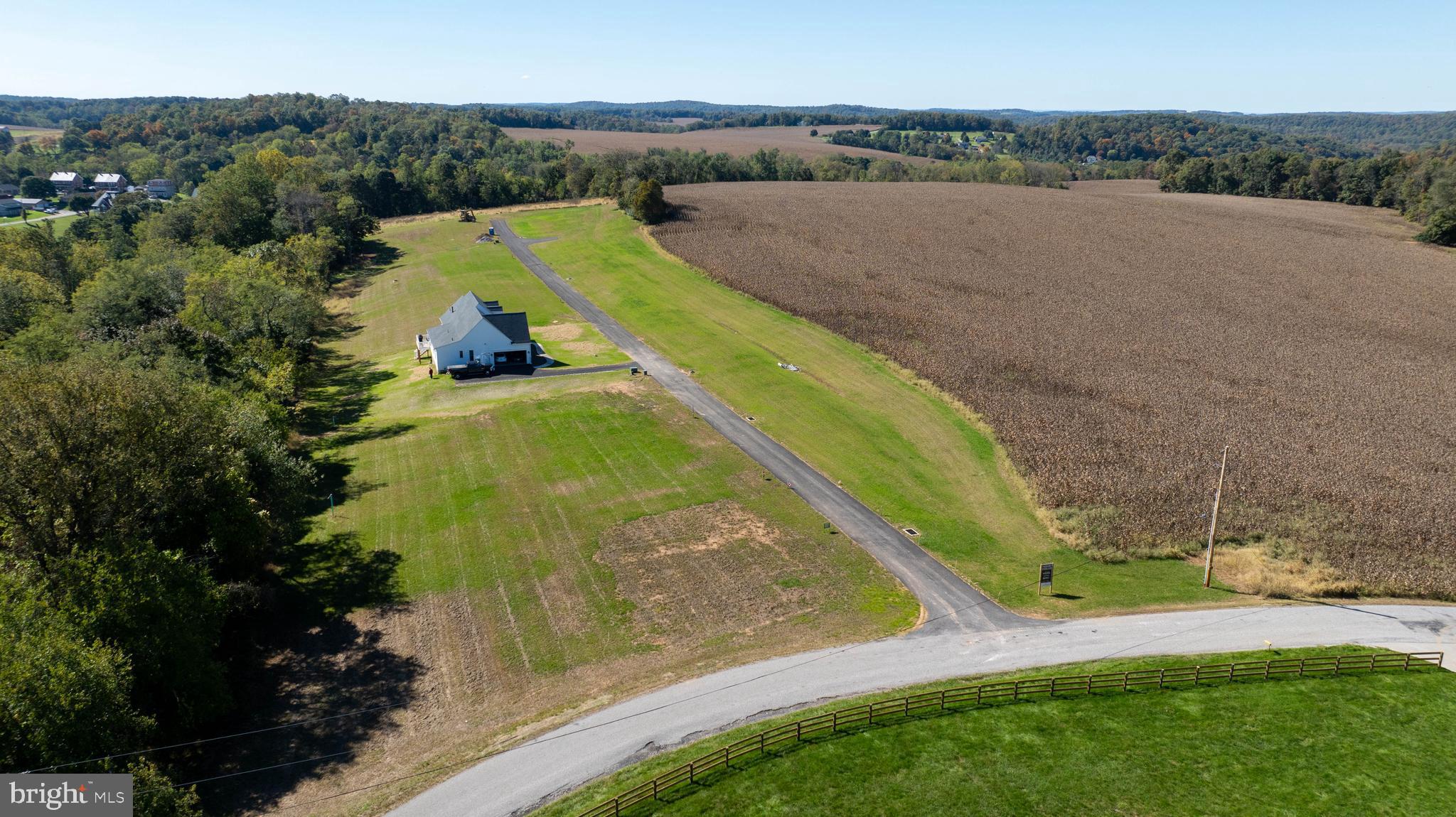 10 Harambe Overlook Railroad, PA 17355 - Photo 8 of 16 a view of a lake with a yard