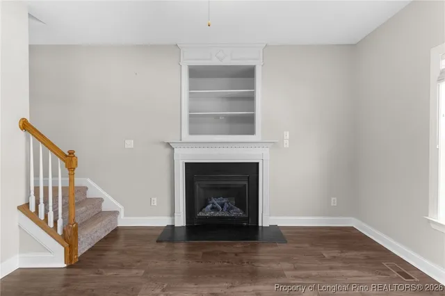 a living room with a fireplace