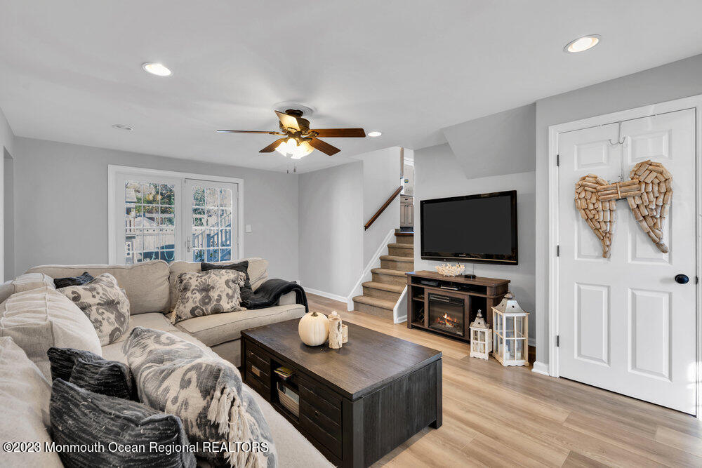 17 Eisele Avenue Asbury Park, NJ 07712 - Photo 13 of 52 a living room with furniture and a flat screen tv