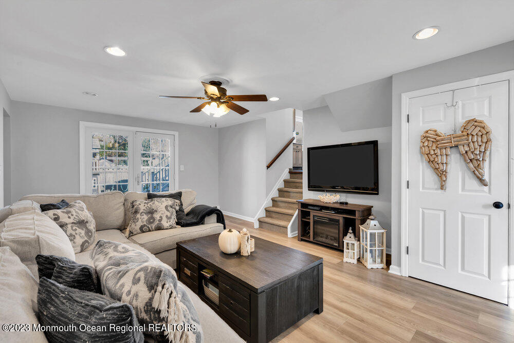 17 Eisele Avenue Asbury Park, NJ 07712 - Photo 14 of 52 a living room with furniture and a flat screen tv