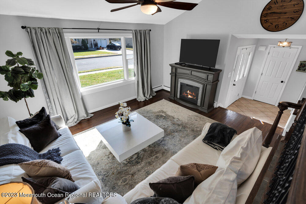 17 Eisele Avenue Asbury Park, NJ 07712 - Photo 26 of 52 a living room with furniture and a flat screen tv