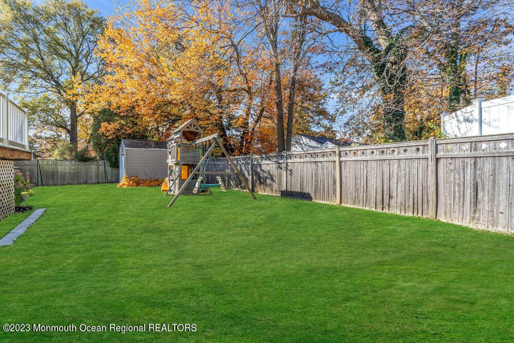 17 Eisele Avenue Asbury Park, NJ 07712 - Photo 49 of 52 a view of a yard with large trees