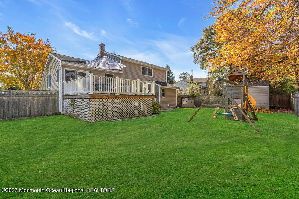 17 Eisele Avenue Asbury Park, NJ 07712 - Photo 50 of 52 a front view of house with a garden